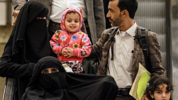 Yemeni children and their guardians arrive after a United Nations medical evacuation from Sanaa at Queen Alia International Airport, south of the Jordanian capital Amman, on February 3, 2020, in what the UN hopes will be the first of many "mercy flights". Seven young patients and their relatives flew out of Sanaa airport, which a Saudi-led coalition supporting the embattled Yemeni government has kept closed to commercial flights since 2016. The UN-marked plane later landed in the Jordanian capital Amman, wh