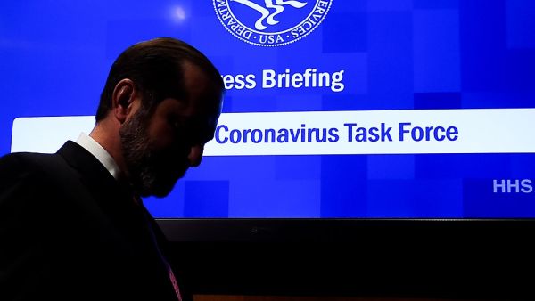 Health and Human Services Secretary Alex Azar leaves after speaking during a press conference on the coordinated public health response to the 2019 coronavirus (2019-nCoV) on February 7, 2020 in Washington, DC. Olivier DOULIERY / AFP