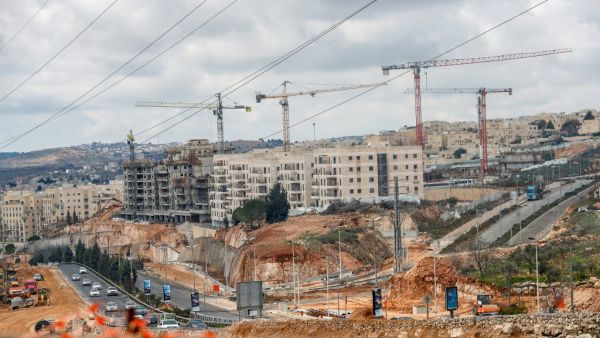 A picture taken on February 11, 2020 shows a view of ongoing construction work at Ramat Shlomo, a Jewish settlement in the Israeli-annexed eastern sector of Jerusalem. AHMAD GHARABLI / AFP