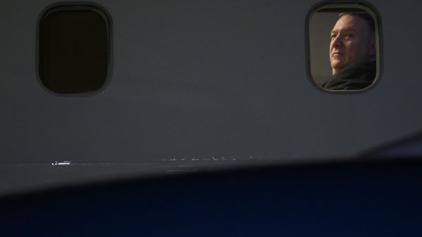 US Secretary of State Mike Pompeo looks on from his plane after landing at the airport in Addis Ababa on February 17, 2020. ANDREW CABALLERO-REYNOLDS / AFP