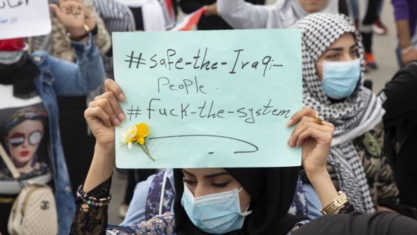 Iraqi students take part in an anti-government protest in the southern city of Basra on February 18, 2020. Since October, the country of 40 million has been rocked by a historically large grassroots movement with big goals: ending corruption, unaccountable sectarian parties and overreach from neighbouring Iran. Hussein FALEH / AFP