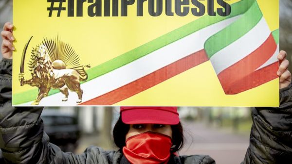 Opponents to the Iranian regime protest outside the Iranian embassy in The Hague on February 21, 2020 as Iran holds today general election that conservatives are expected to dominate amid voter apathy amid an economic slump, multiple crises and the disqualification of thousands of candidates. Sem VAN DER WAL / ANP / AFP