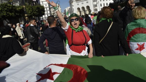 Algerian protesters shout slogans during their weekly anti-government demonstration in the capital Algiers, on February 21, 2020. RYAD KRAMDI / AFP
