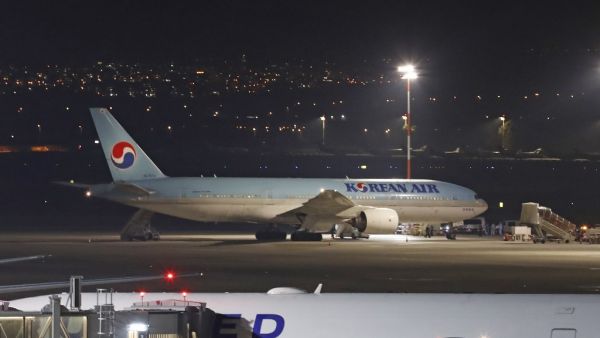 A Korean airplane which arrived from South Korea is pictured after landing at Ben Gurion International Airport on February 22, 2020. Israel refused to allow some 200 non-Israelis to disembark from a plane which arrived from South Korea. AFP
