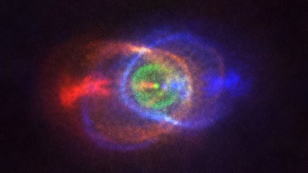 In observations from from Alma (pictured) gases expelled from the stars collision can be seen floating around the nebula in a complex and strange array. (ALMA)