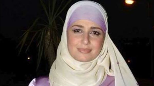 Hala, 40, was 18 years old when the picture was taken