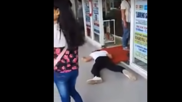 A Filipino vlogger was arrested after he pretended to fall unconscious while wearing a face mask. (Video Screenshot)