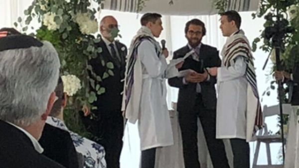Officiated my first wedding for two Orthodox Jews as an Orthodox rabbi. Times they are a changin.’ (Twitter/@RabbiAvMlotek)