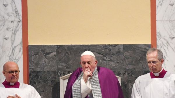 Pope Francis attends the Ash Wednesday mass which opens Lent, the forty-day period of abstinence and deprivation for Christians before Holy Week and Easter, on February 26, 2020, at the Santa Sabina church in Rome. Pope Francis postponed his official appointments on February 28 and was working from home, the Vatican said, a day after cancelling a scheduled appearance at mass because of "a mild ailment". Francis, 83, had appeared earlier in the week to be suffering from a cold. He was seen blowing his nose a