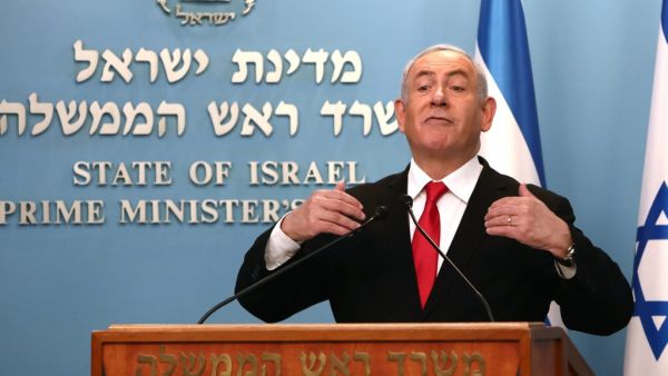 Israeli Prime Minister Benjamin Netanyahu delivers an speech at his Jerusalem office on March 14, 2020, regarding the new measures that will be taken to fight the Corona virus in Israel. Netanyahu said Israel would shut down eateries, shopping centres and gyms in a bid to halt the spread of coronavirus. Netanyahu also said he would ask the government's approval in the upcoming cabinet meeting set to be held via video conference to allow "technologies used in the war against terror" to be used to track the m