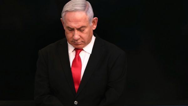 Israeli Prime Minister Benjamin Netanyahu arrives for a speech at his Jerusalem office on March 14, 2020, regarding the new measures that will be taken to fight the Corona virus in Israel. Netanyahu said Israel would shut down eateries, shopping centres and gyms in a bid to halt the spread of coronavirus. AFP/File