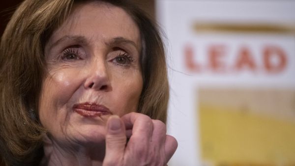 U.S. Speaker of the House Nancy Pelosi (D-CA) stands in front of a poster documenting lead in schools during an announcement to media on the Rebuild America's Schools Act on March 3, 2020 in Washington, DC. The act makes a $100 billion investment to both help repair and improve the physical and digital infrastructure of public schools. Mark Makela/Getty Images/AFP Mark Makela / GETTY IMAGES NORTH AMERICA / AFP