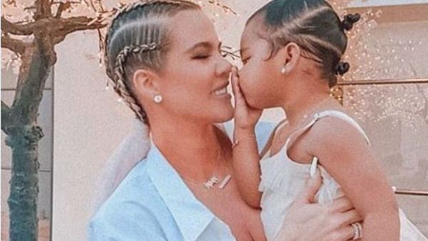 Denied! Khloé Kardashian, 35, posted a cute picture of her going in for a kiss and getting block by her 22-month-old daughter True Thompson on Friday (Instagram)