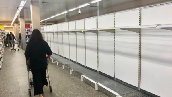 Shelves in stores all over the world, including this shop in Sydney, Australia, are being emptied. Photo: AFP/Izhar Khan/NurPhoto