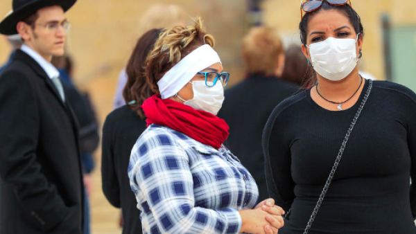 Israel Women visiting Jerusalem’s nearly deserted after Israel imposed some of the world's tightest restrictions to contain COVID-19 coronavirus disease AFP/File