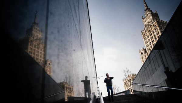 A man enters an underground passage in downtown Moscow on April 9, 2020, during the strict lockdown in Russia to stop the spread of the novel coronavirus COVID-19. Dimitar DILKOFF / AFP