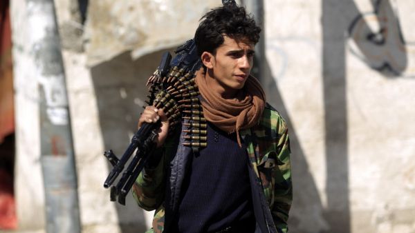 In this file photo taken on November 09, 2019, a Shiite Huthi rebel fighter stands guard during a gathering to celebrate the birth of Islam's Prophet Mohammed in the Yemeni capital Sanaa. AFP/File