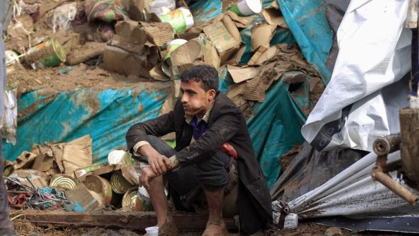 A Yemeni street vendor looks at his damaged stall due to floods following heavy rains in the capital Sanaa, on April 14, 2020. Mohammed HUWAIS / AFP