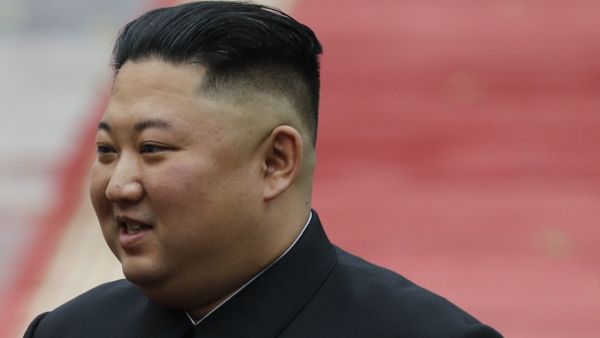 This file photo taken on March 1, 2019 shows North Korea's leader Kim Jong Un attending a welcoming ceremony at the Presidential Palace in Hanoi. A train likely belonging to North Korean leader Kim Jong Un has been spotted at a resort town in the country's east, satellite photos reviewed by a US-based think tank showed on April 26, 2020, as speculation persists over his health. KHAM / POOL / AFP
