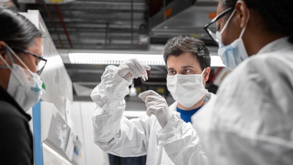 Mirimus, Inc. lab scientists look over COVID-19 samples from recovered patients on April 10, 2020 in the Brooklyn borough of New York City. Misha Friedman/Getty Images/AFP