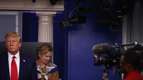 White House coronavirus response coordinator Deborah Birx, and U.S. President Donald Trump participate in a briefing following a meeting of his coronavirus task force in the Brady Press Briefing Room at the White House on April 6, 2020 in Washington, DC. Infected with COVID-19, British Prime Minister Boris Johnson was admitted intensive care at a hospital in London Monday as the U.S. death toll surpassed 10,000. Chip Somodevilla/Getty Images/AFP CHIP SOMODEVILLA / GETTY IMAGES NORTH AMERICA / Getty Images v