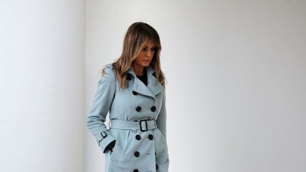 U.S. first lady Melania Trump heads back into the White House after hosting the 140th annual Easter Egg Roll on the South Lawn April 2, 2018 in Washington, DC. The White House said they are expecting 30,000 children and adults to participate in the annual tradition of rolling colored eggs down the White House lawn that was started by President Rutherford B. Hayes in 1878. Chip Somodevilla/Getty Images/AFP CHIP SOMODEVILLA / GETTY IMAGES NORTH AMERICA / Getty Images via AFP