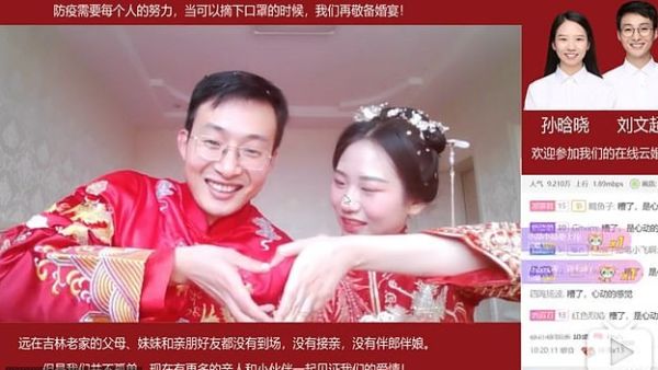The groom, Liu Wenchao, tied the knot with his bride, Sun Hanxiao, on March 20, while millions of web users witnessed their special day on a Chinese video-sharing website Bilibili (Liu Wenchao/Bilibili/DailyMail)