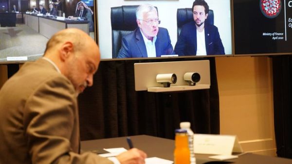 King Abdullah II chairs, via teleconference a meeting attended by HRH Crown Prince Al Hussein, to discuss measures to mitigate economic impact of COVID-19 (Twitter)