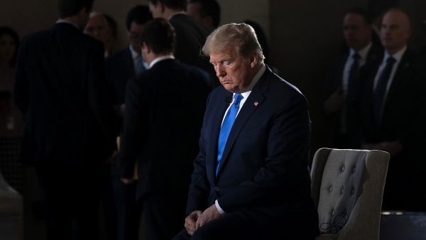 US President Donald Trump gestures during a commercial break of a Fox News virtual town hall "America Together: Returning to Work," event from the Lincoln Memorial in Washington, DC on May 3, 2020. Trump will answer questions submitted by viewers on Twitter, Facebook and Instagram. JIM WATSON / AFP