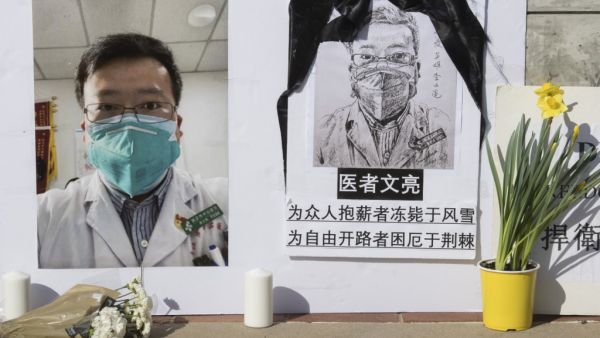 In this file photo a memorial for Dr Li Wenliang, who was the whistleblower of the Coronavirus, Covid-19, that originated in Wuhan, China and caused the doctor's death in that city, is pictured outside the UCLA campus in Westwood, California, on February 15, 2020. US lawmakers on May 7, 2020 proposed renaming the street in front of China's embassy after the late Wuhan doctor punished after warning about the new coronavirus, a step sure to outrage Beijing. The measure would rechristen the section of the Wash
