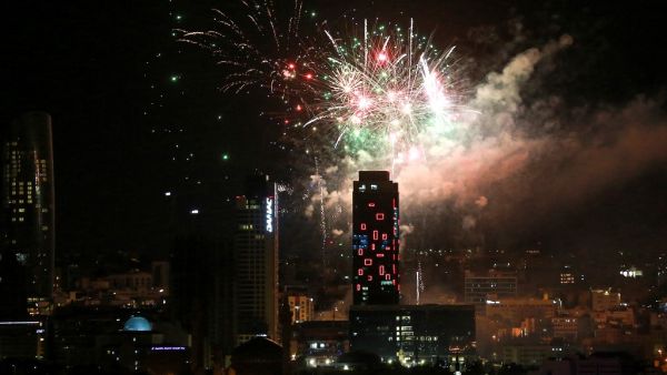 Fireworks light up the sky above the Abdali Boulevard in the centre of Jordan's capital Amman on May 25, 2020, as the country marks its 74th Independence Day. Khalil MAZRAAWI / AFP