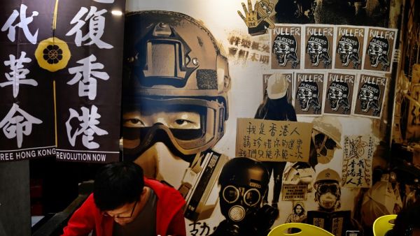 A man eats lunch at the Aegis, a restaurant started by a Hong Kong lawyer which helps Hongkongers who have left the city, in Taipei on May 27, 2020. (AFP)