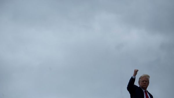US President Donald Trump boards Air Force One at Joint Base Andrews in Maryland on May 27, 2020, in Maryland. President Donald Trump traveled to the Kennedy Space Center in Florida Wednesday afternoon to attend the launch of the SpaceX's historic first crewed launch into space in nearly a decade. Brendan Smialowski / AFP