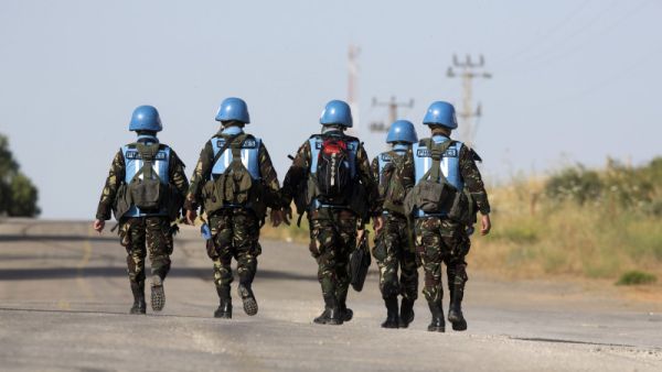 United Nations (UN) peacekeepers. (Photo credit should read MENAHEM KAHANA/AFP/Getty Images)