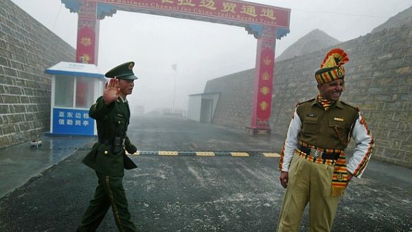  150 soldiers from China (left) and India (right) were seen fighting against each other in the strategic mountain pass of Nathu La (pictured) on Saturday. (AFP)