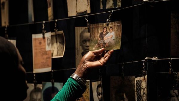 A visitor looking at victims' portraits at the Kigali Genocide Memorial in Kigali, Rwanda. (AFP/ File Photo)