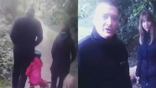 Video shows the little girl riding her bike down Blackwell Trail in Derbyshire before colliding into a dogwalking couple and causing a row between them and her father. (Video Screenshots)