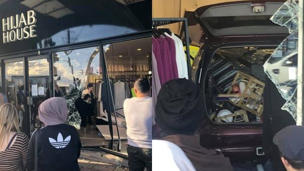 In footage of the incident, the driver of the SUV ploughed into another, smaller car, before driving directly into the shopfront. (Twitter)