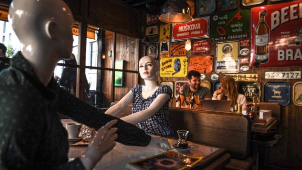 Mannequins, are placed on some tables by the cafe owner to keep keeping social distancing rules with customers, during the reopening restaurants and cafes in Istanbul on June 1, 2020 . Turkey reopened restaurants, cafes and Istanbul's iconic 15th century Grand Bazaar market on Monday as the government further eased coronavirus restrictions.Many other facilities including parks, beaches, libraries and museums also reopened across the country, while millions of public sector employees returned to work. Ozan K
