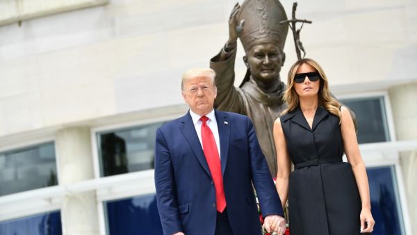 US President Donald Trump and First Lady Melania Trump visit the Saint John Paul II National Shrine, to lay a ceremonial wreath and observe a moment of remembrance under the Statue of Saint John Paul II on June 2, 2020 in Washington,DC. Brendan Smialowski / AFP
