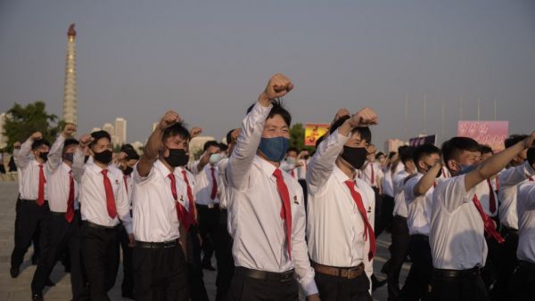 North Korean students take part in a rally denouncing 'defectors from the North' as they march from the Pyongyang Youth Park Open-Air Theatre to Kim Il Sung Square in Pyongyang on June 8, 2020. North Korea on June 6 threatened to close a liaison office with the South as officials seethe over anti-Pyongyang leaflets sent across the border, saying further steps were also in the pipeline to make Seoul "suffer". The warning is the second in two days of possible retaliation over Seoul's failure to stop North Kor