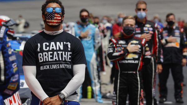 In this file photo taken on June 06, 2020 Bubba Wallace, driver of the #43 McDonald's Chevrolet, wears a "I Can't Breath - Black Lives Matter" T-shirt under his fire suit in solidarity with protesters around the world taking to the streets after the death of George Floyd on May 25. (AFP/File)