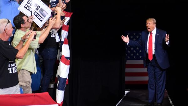 US President Donald Trump arrives for a campaign rally at the BOK Center on June 20, 2020 in Tulsa, Oklahoma. Hundreds of supporters lined up early for Donald Trump's first political rally in months, saying the risk of contracting COVID-19 in a big, packed arena would not keep them from hearing the president's campaign message. Nicholas Kamm / AFP