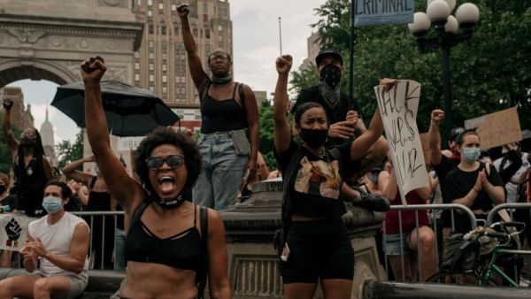 Demonstrators denouncing systemic racism and the police killings of black Americans rally in Washington Square Park in the borough of Manhattan on June 6, 2020 in New York City. This is the 12th day of protests since George Floyd died in Minneapolis police custody on May 25. Scott Heins/Getty Images/AFP Scott Heins / GETTY IMAGES NORTH AMERICA / Getty Images via AFP