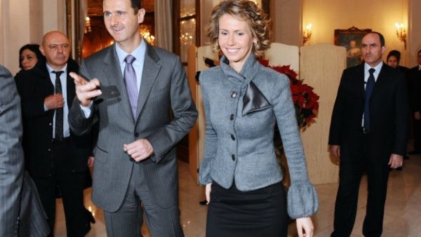 Bashar Al Asad and his wife Asma (MIGUEL MEDINA/AFP/Getty Images)