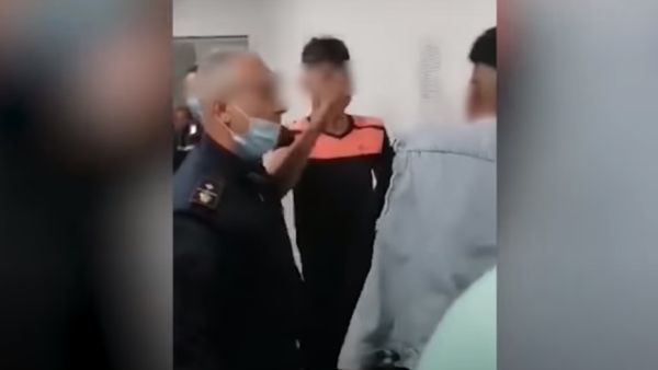 Police officer slapping a Tunisian migrant (youtube)