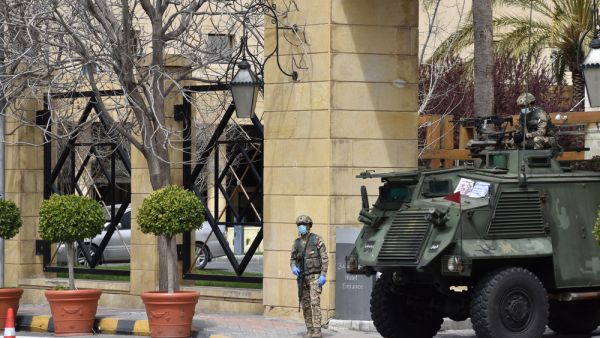 Soldiers outside a hotel in Amman, Jordan. The country is currently under strict curfew enforced by the military to combat coronavirus. (Shutterstock/ File Photo)