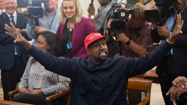 Kanye West meets with US President Donald Trump in the Oval Office of the White House in Washington, DC, October 11, 2018. Kanye West, the entertainment mogul who urges listeners in one song to "reach for the stars, so if you fall, you land on a cloud," announced SJuly 4, 2020, he is challenging Donald Trump for the US presidency in 2020. SAUL LOEB / AFP