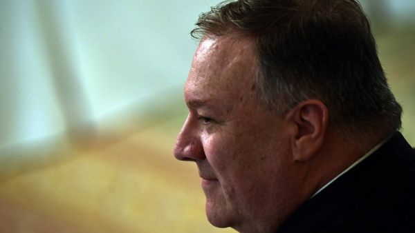 In this file photo taken on May 19, 2020 US Secretary of State Mike Pompeo looks on as President Donald Trump meets with his cabinet in the Cabinet Room of the White House in Washington, DC. The US Congress on July 2, 2020 passed tough new sanctions that target banks over violations of Hong Kong's autonomy, dialing up the pressure on China over the harsh security law it imposed on the financial hub. Brendan Smialowski / AFP