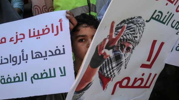 Palestinian supporters of Hamas attend a rally against Israel's West Bank annexation plans, in Rafah in the southern Gaza Strip on July 3, 2020. Rival Palestinian factions Fatah and Hamas pledged unity against Israel's West Bank annexation plans in a rare joint conference earlier in the week, as signs emerged of a rift between Israel and Washington over the project. SAID KHATIB / AFP